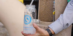 Water bottle being filled