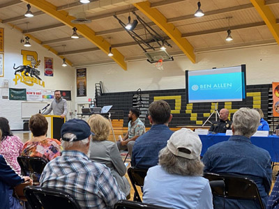 Attendees at the Prepared Peninsula Expo and Town Hall watching a presentation