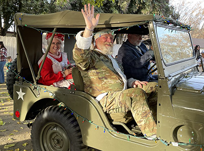 Santa Claus in a jeep during Operation Santa