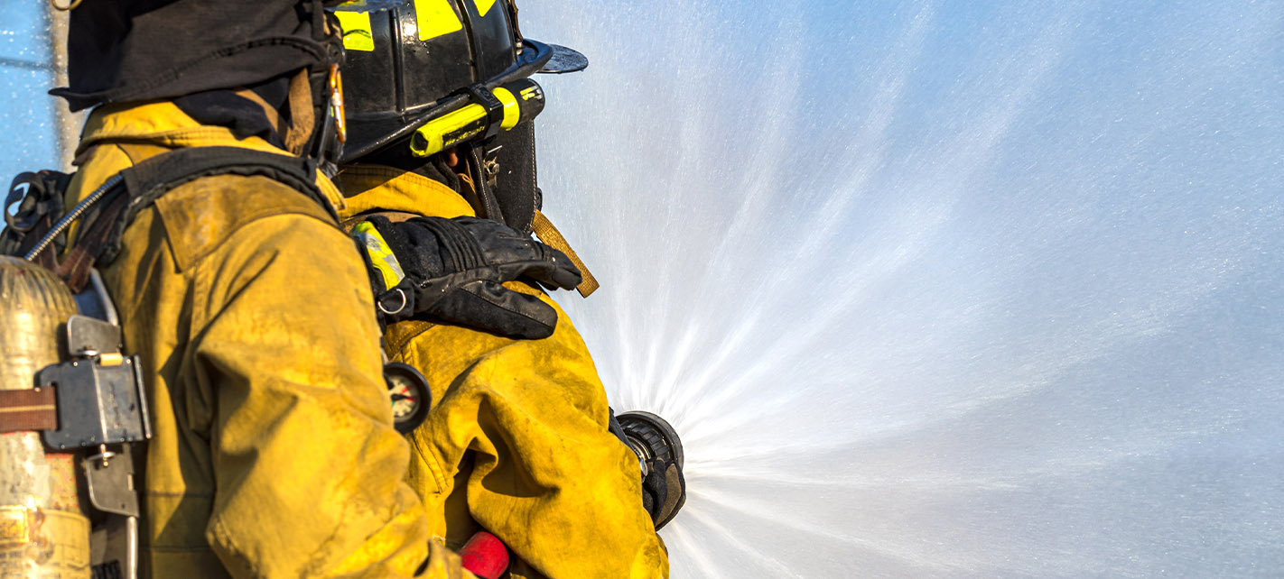 Firefighters with hose